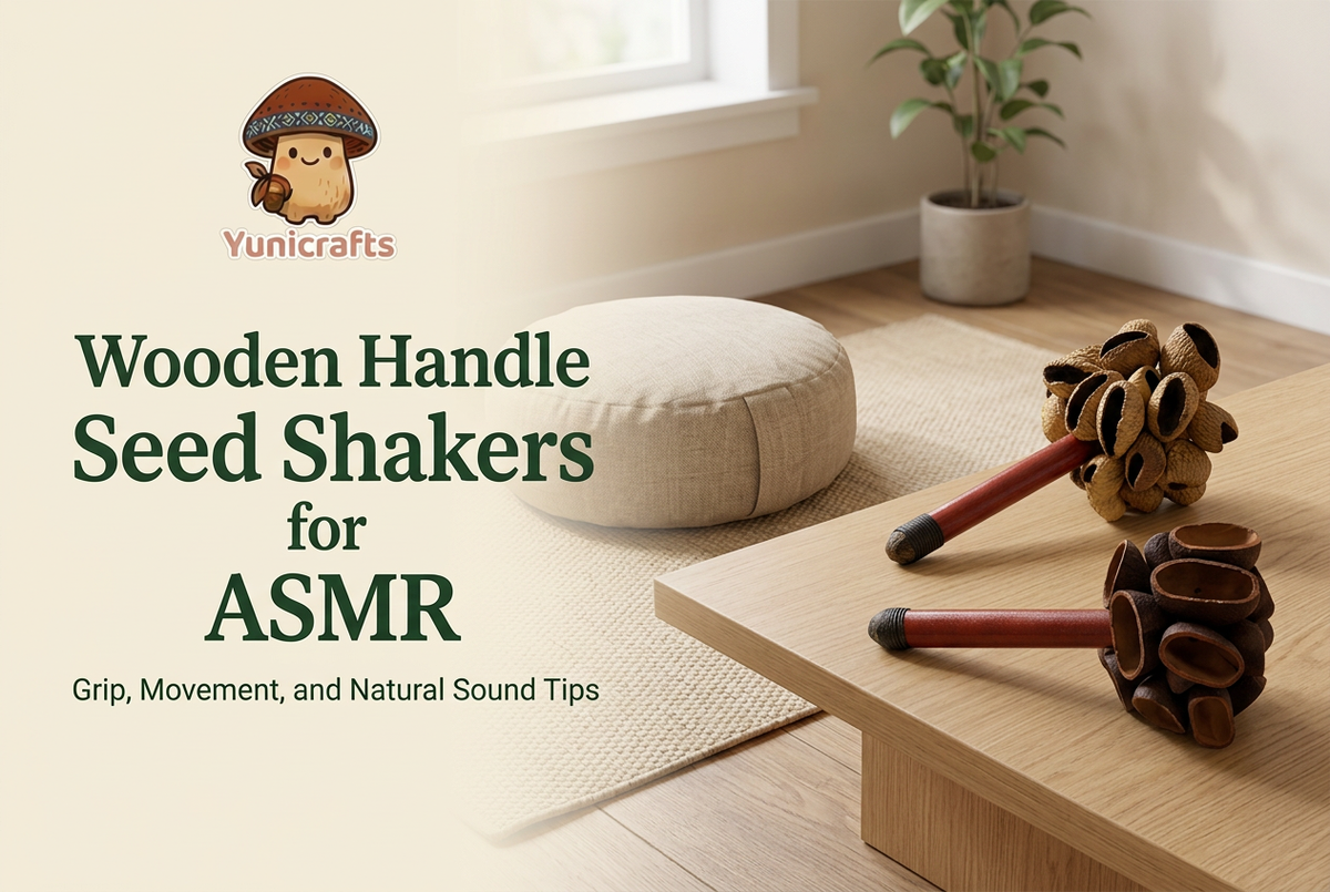 Panji and Juju wooden handle seed shakers on a low wooden table beside a meditation cushion in a sunlit room.