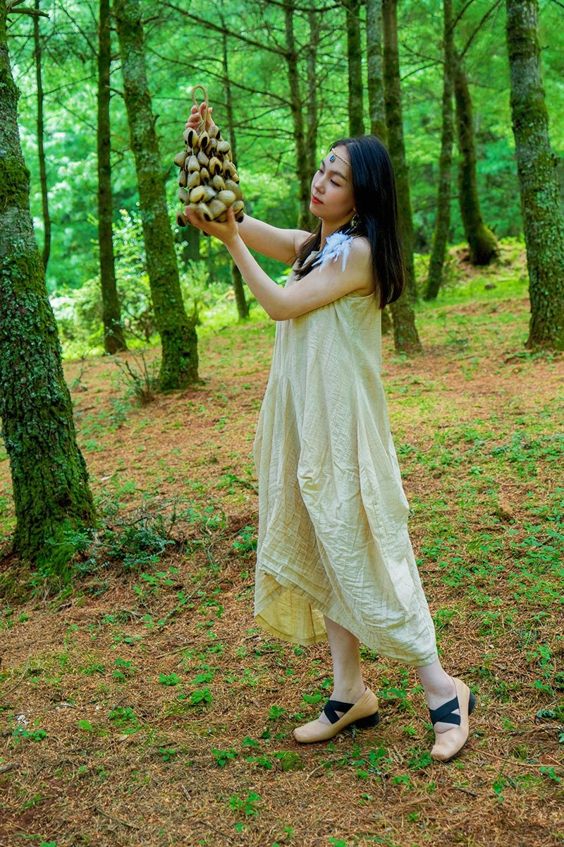 Handmade Panji White Fruit Seed Shell Hand Bell – Natural Rainforest Sound Decor