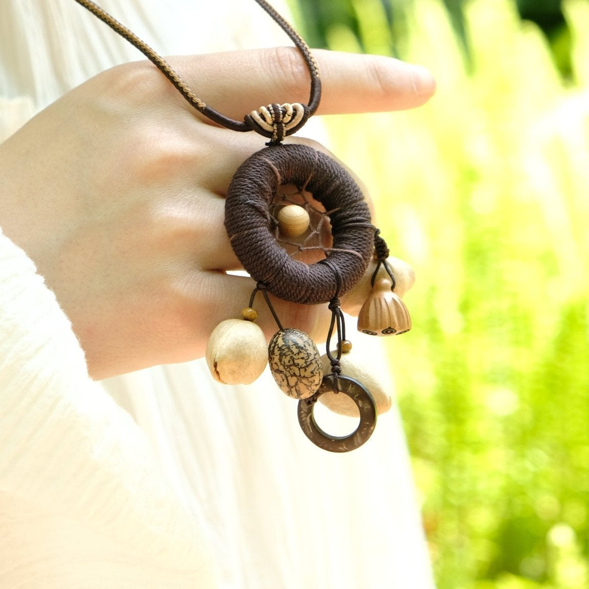 "The Dream Weaver" - Hand - Woven Dreamcatcher Necklace with Natural Seeds - Yunicrafts