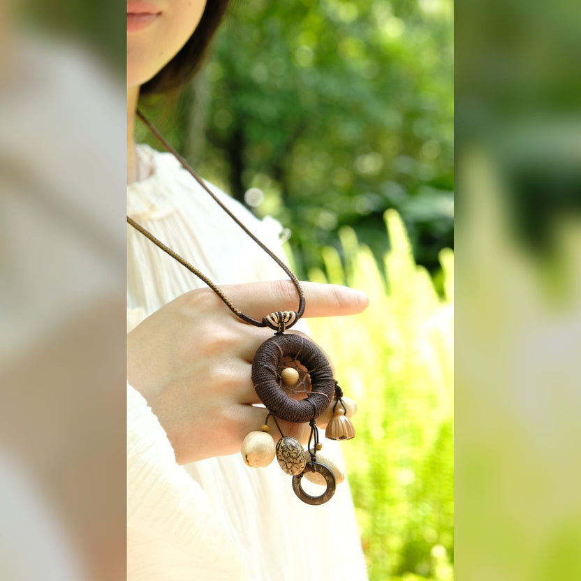 "The Dream Weaver" - Hand - Woven Dreamcatcher Necklace with Natural Seeds - Yunicrafts