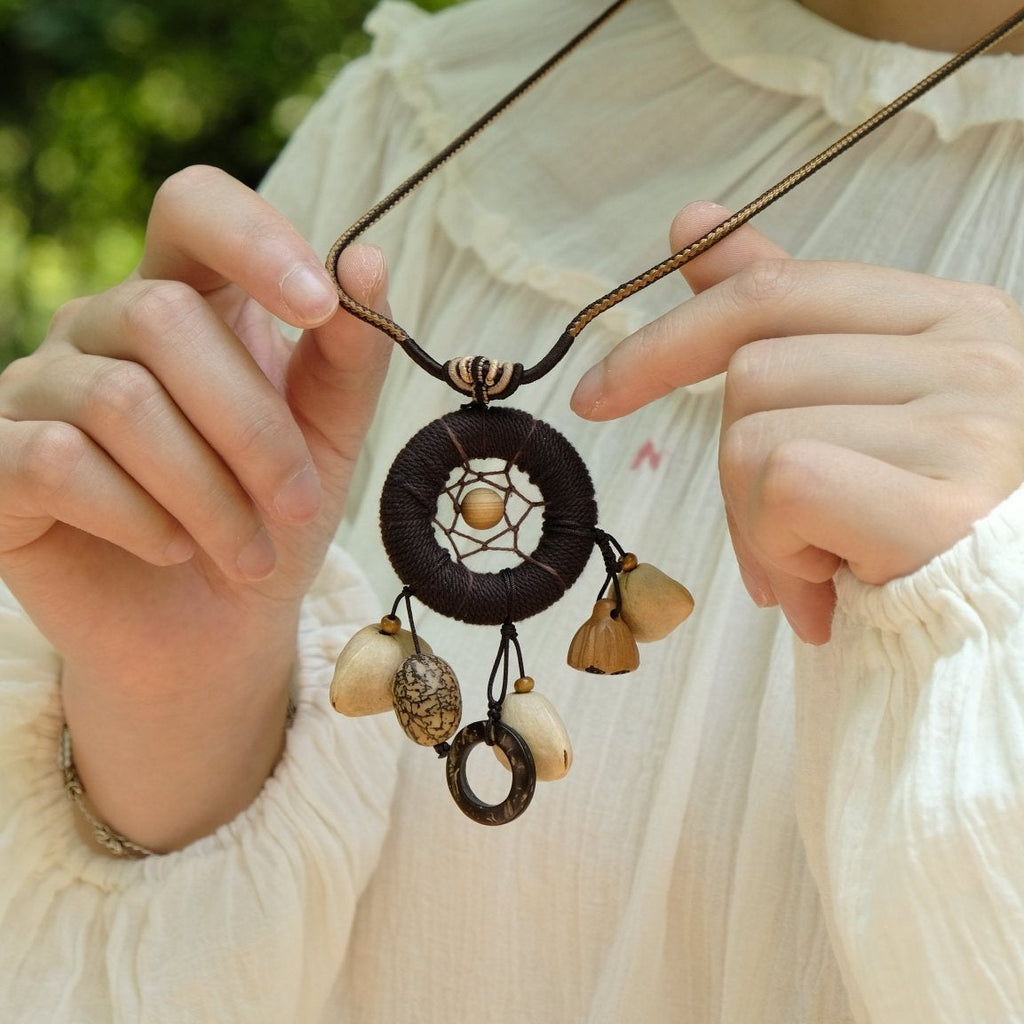 "The Dream Weaver" - Hand - Woven Dreamcatcher Necklace with Natural Seeds - Yunicrafts