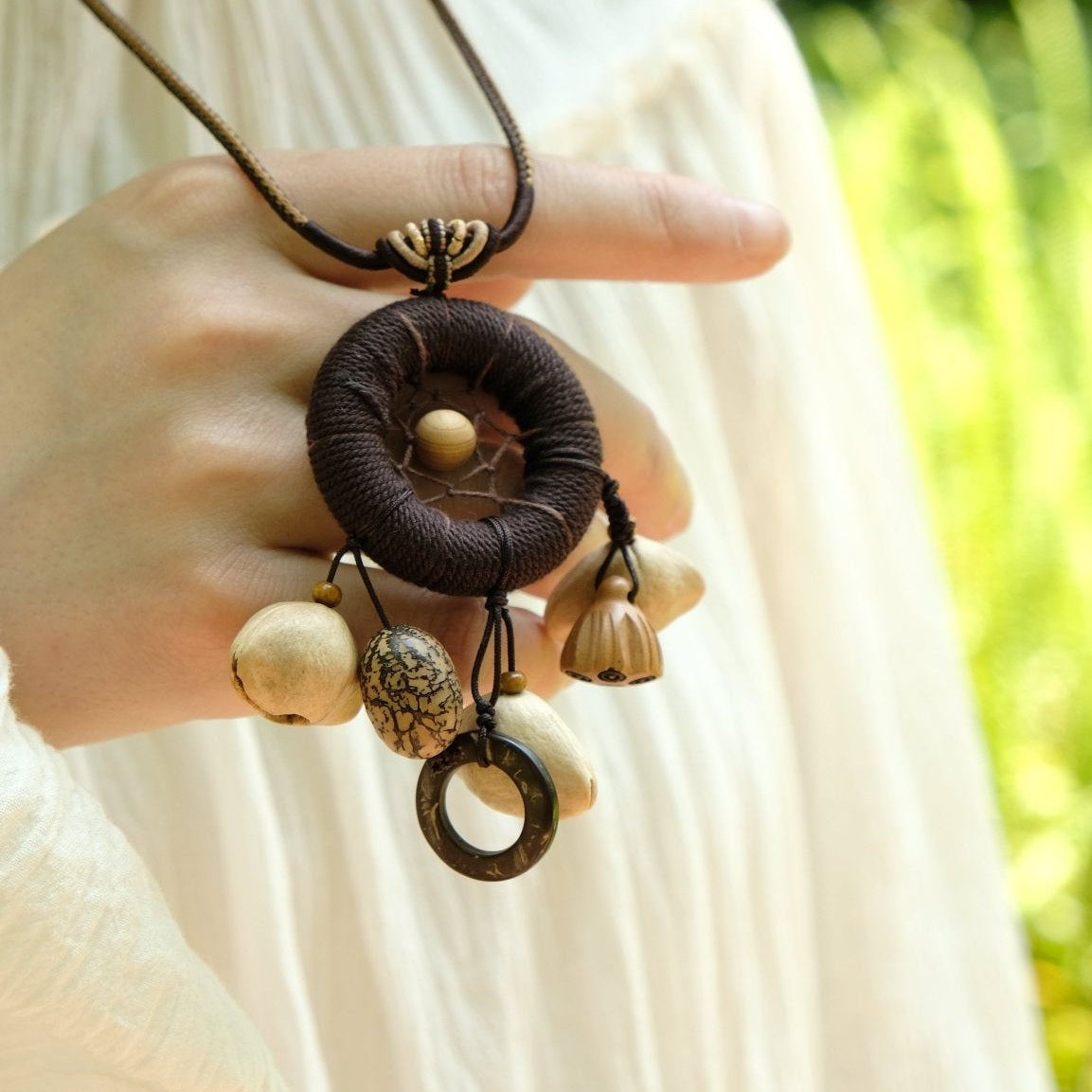 "The Dream Weaver" - Hand - Woven Dreamcatcher Necklace with Natural Seeds - Yunicrafts
