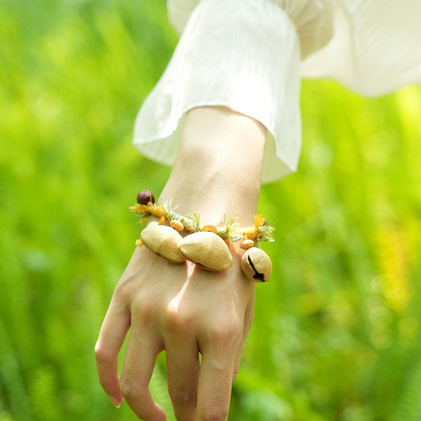 "The Meadow Dancer" - Yellow & Green Braided Bracelet with Natural Seed Bells - Yunicrafts