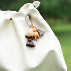 "The Naptime Kitty" - Hand - Carved Wooden Cat Charm with Natural Seeds & Tassel - Yunicrafts