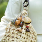 "The Naptime Kitty" - Hand - Carved Wooden Cat Charm with Natural Seeds & Tassel - Yunicrafts