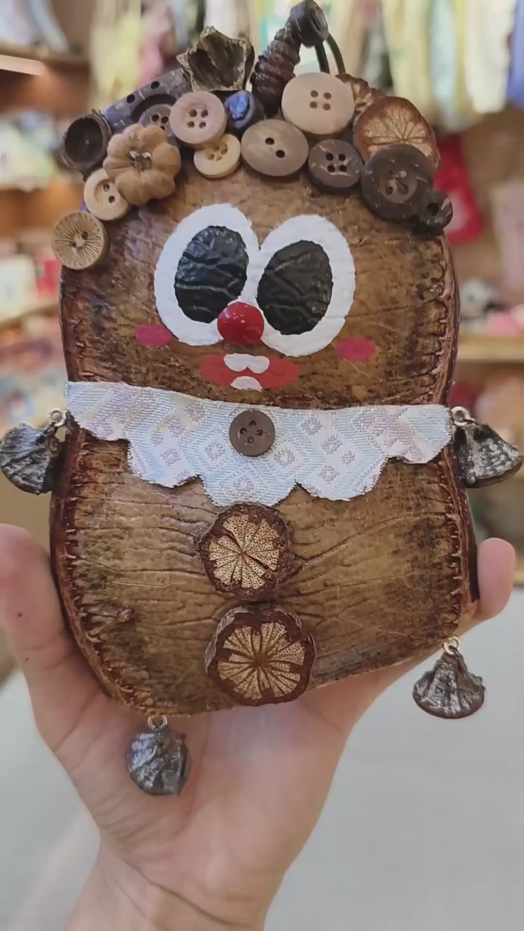 Big-eyed Entada pod owl ornament with button eyes and dangling seed charms