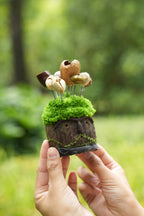 "The Ancient Stone Keeper" - Mossy Moai Totem Nut Shell Doll - Yunicrafts