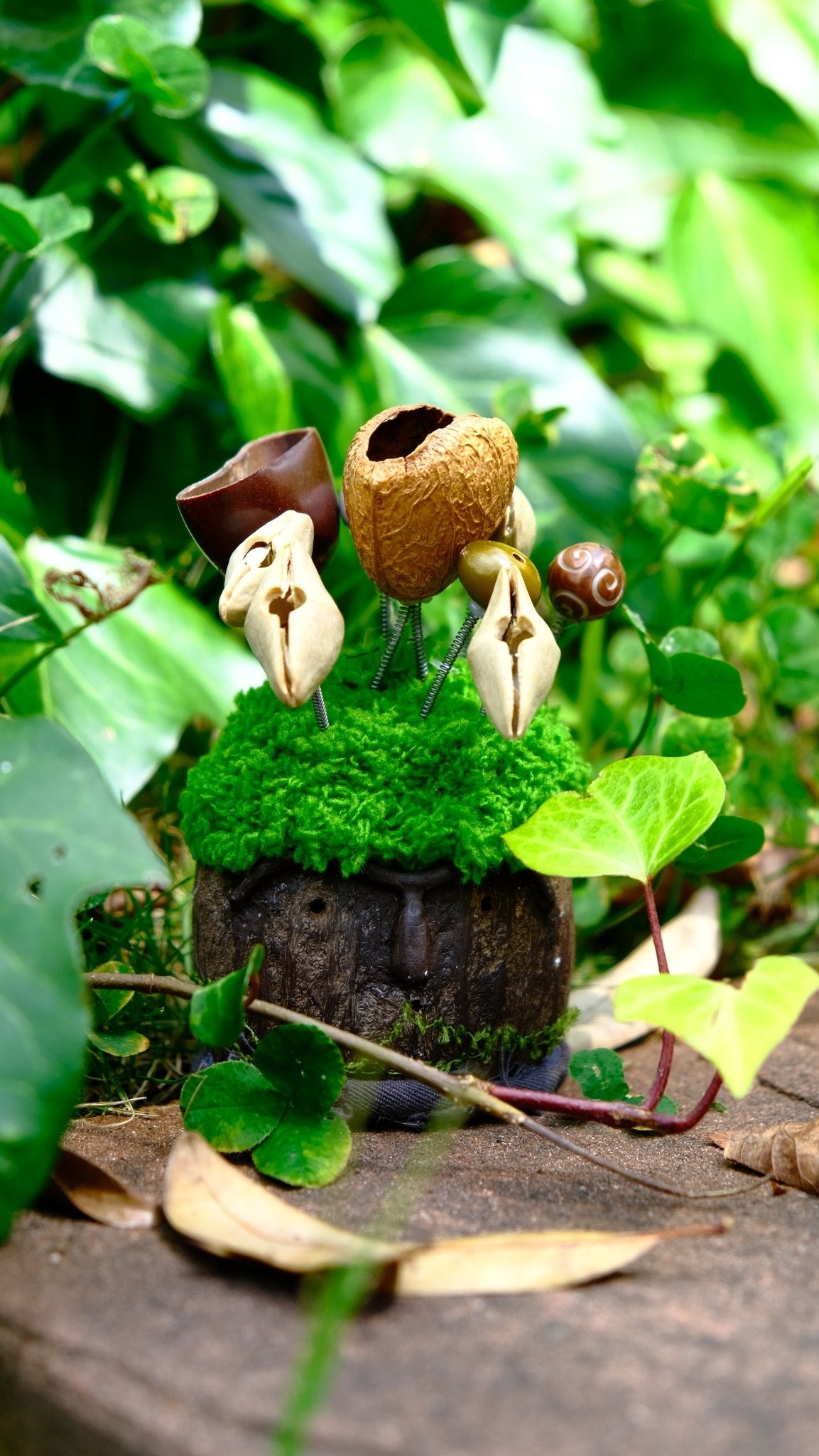 "The Ancient Stone Keeper" - Mossy Moai Totem Nut Shell Doll - Yunicrafts