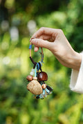"The Azure Spirit" - Natural Nut Bag Charm with Boho Blue Tassel & Wrapped Loop - Yunicrafts