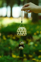 "The Bamboo Lantern" - Hand - Woven Cage Charm with Seed Bells & Emerald Tassel - Yunicrafts