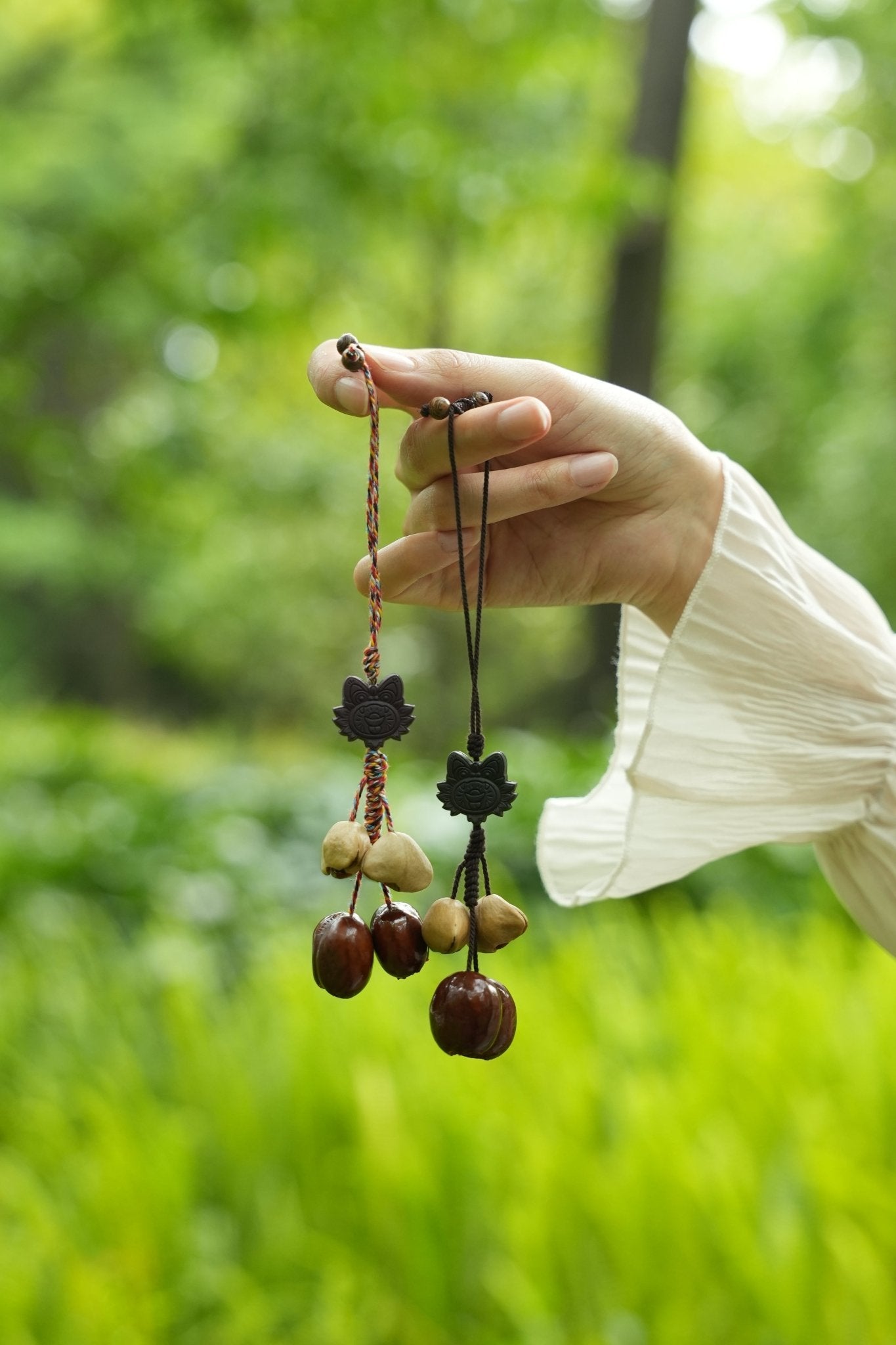 "The Brave Tiger Guardian" - Folk Art Tiger Head Charm with Colorful Cord & Seeds - Yunicrafts