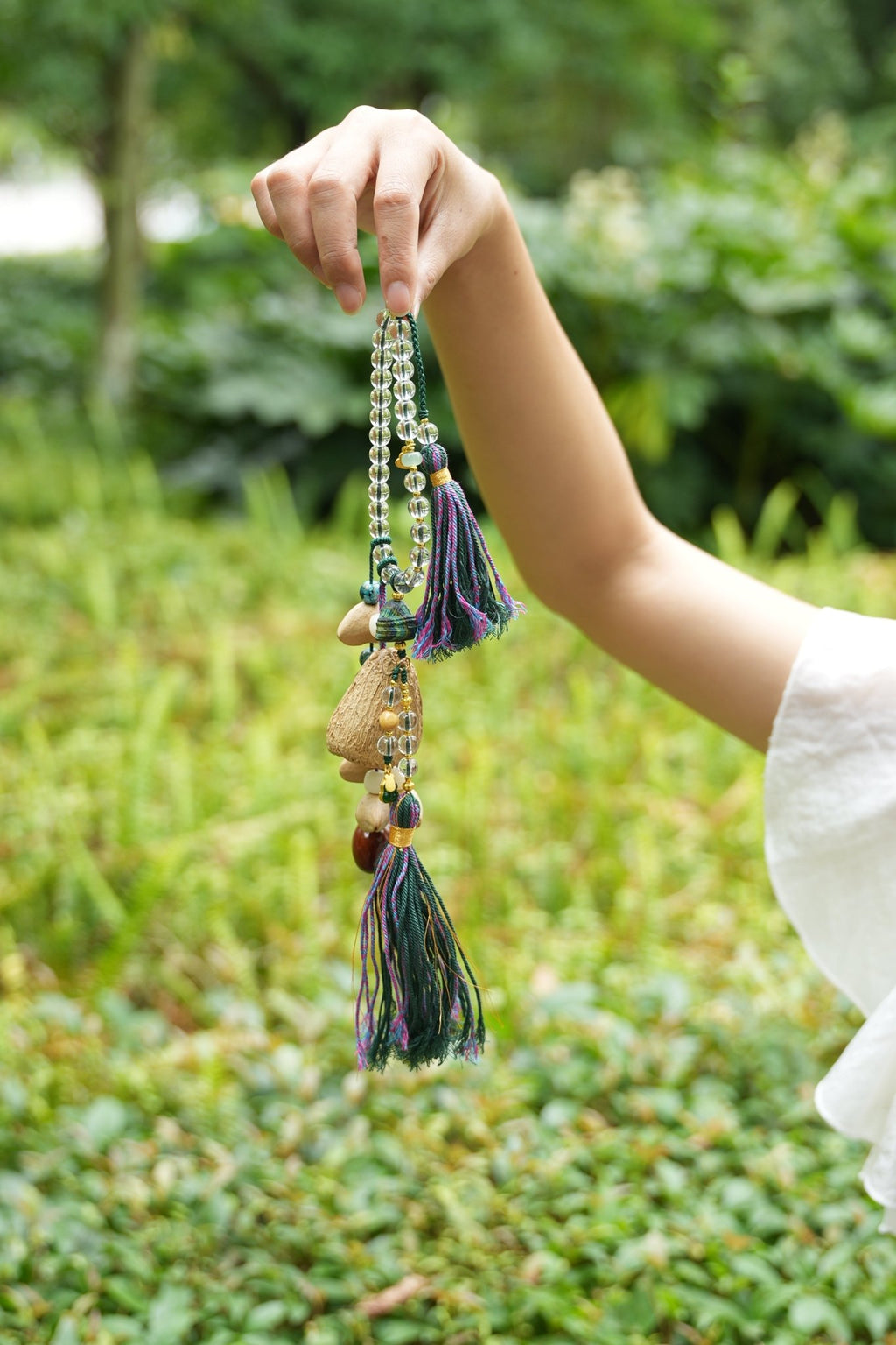 "The Crystal Harmony Tassel" - Natural Seed Charm with Crystal Beads & Silk Tassels - Yunicrafts