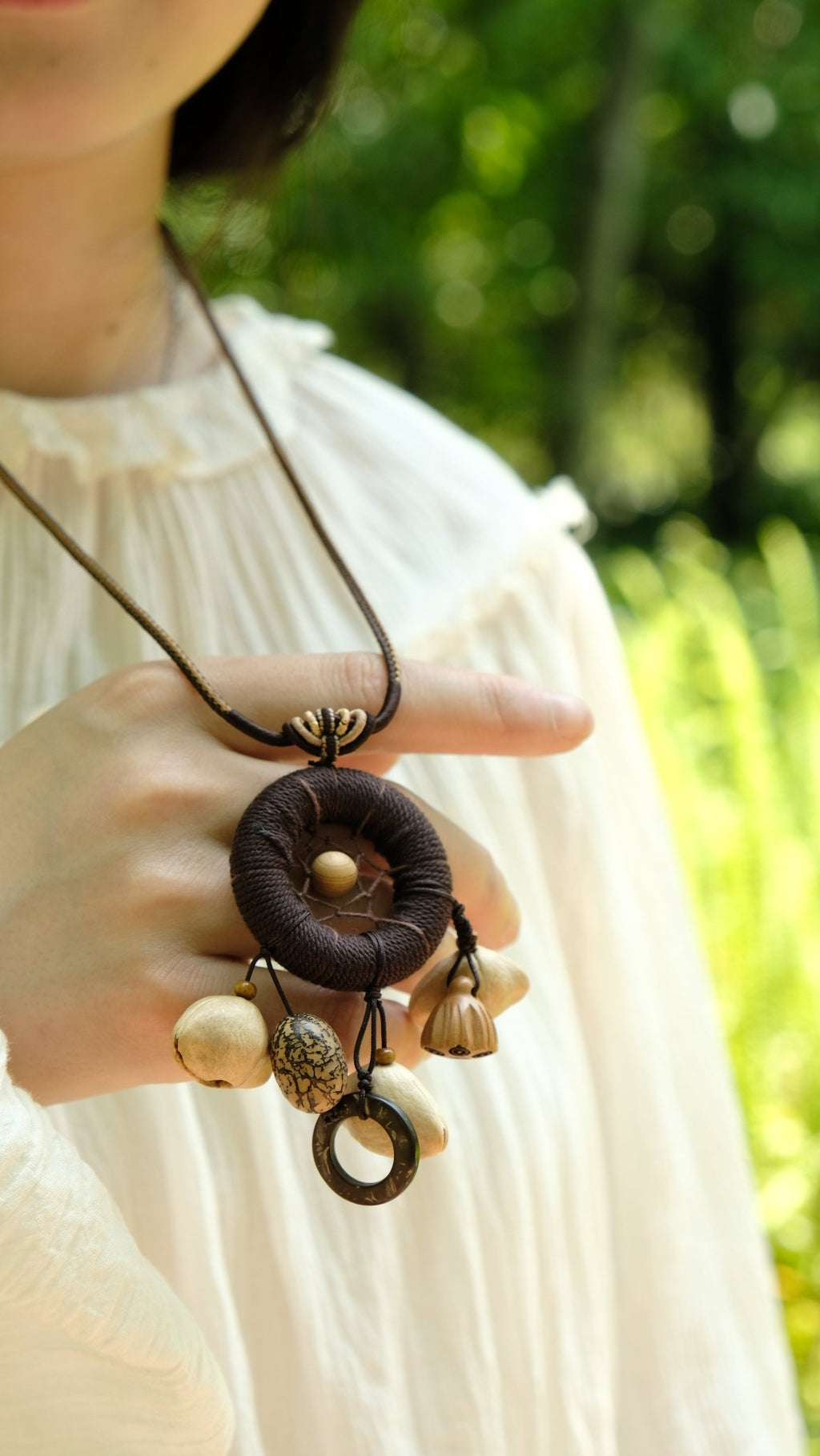 "The Dream Weaver" - Hand - Woven Dreamcatcher Necklace with Natural Seeds - Yunicrafts