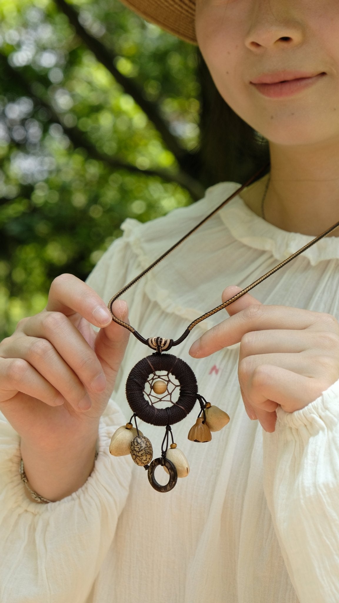 "The Dream Weaver" - Hand - Woven Dreamcatcher Necklace with Natural Seeds - Yunicrafts