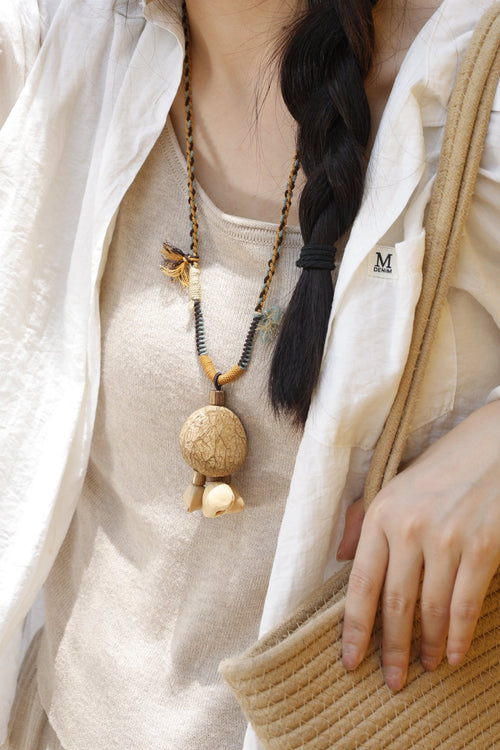 "The Earth Bell" - Large Natural Seed Pod Necklace on Hand - Braided Rope - Yunicrafts