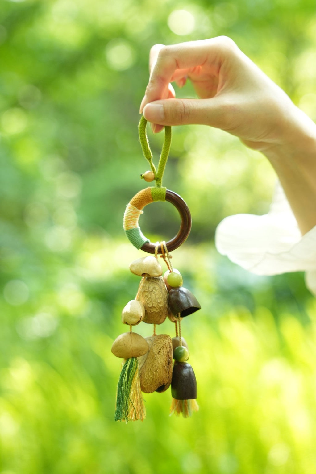 "The Forest Rattle" - Colorful Wrapped Wood Ring & Nut Shell Bag Charm with Tassels - Yunicrafts