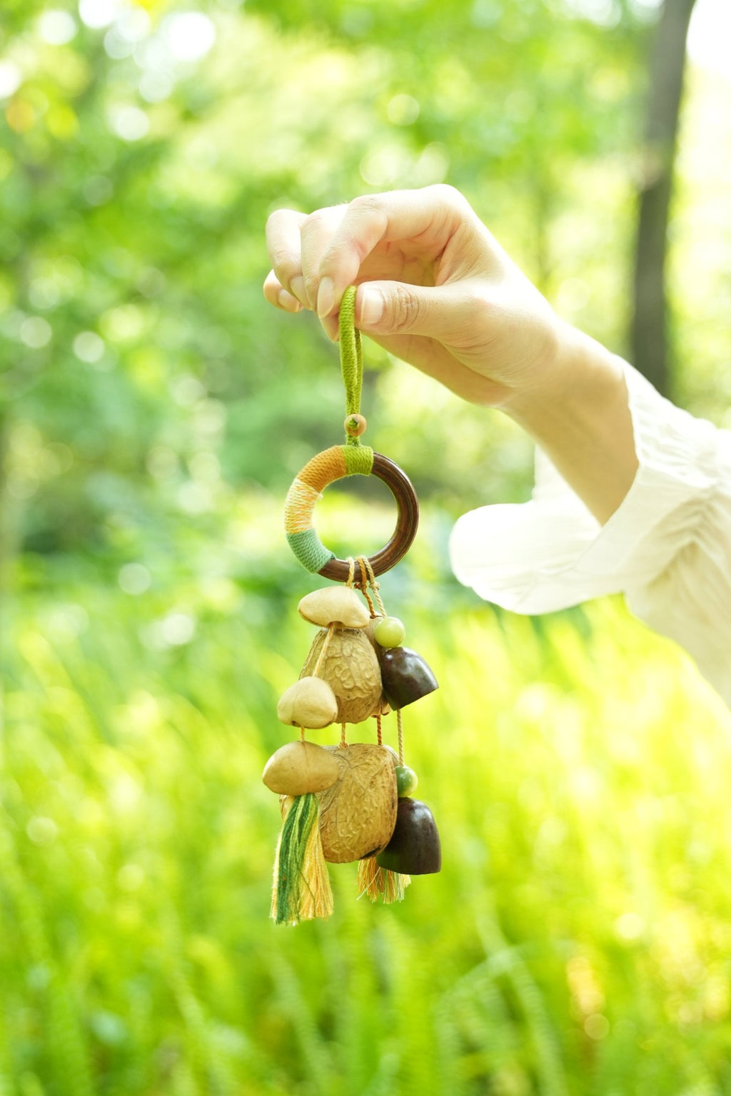 "The Forest Rattle" - Colorful Wrapped Wood Ring & Nut Shell Bag Charm with Tassels - Yunicrafts