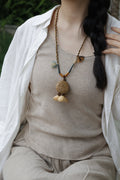 "The Forest Traveler" - Large Seed Pod Necklace with Mustard Wrapped Cord & Blue Tassel - Yunicrafts