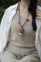 "The Forest Traveler" - Large Seed Pod Necklace with Mustard Wrapped Cord & Blue Tassel - Yunicrafts