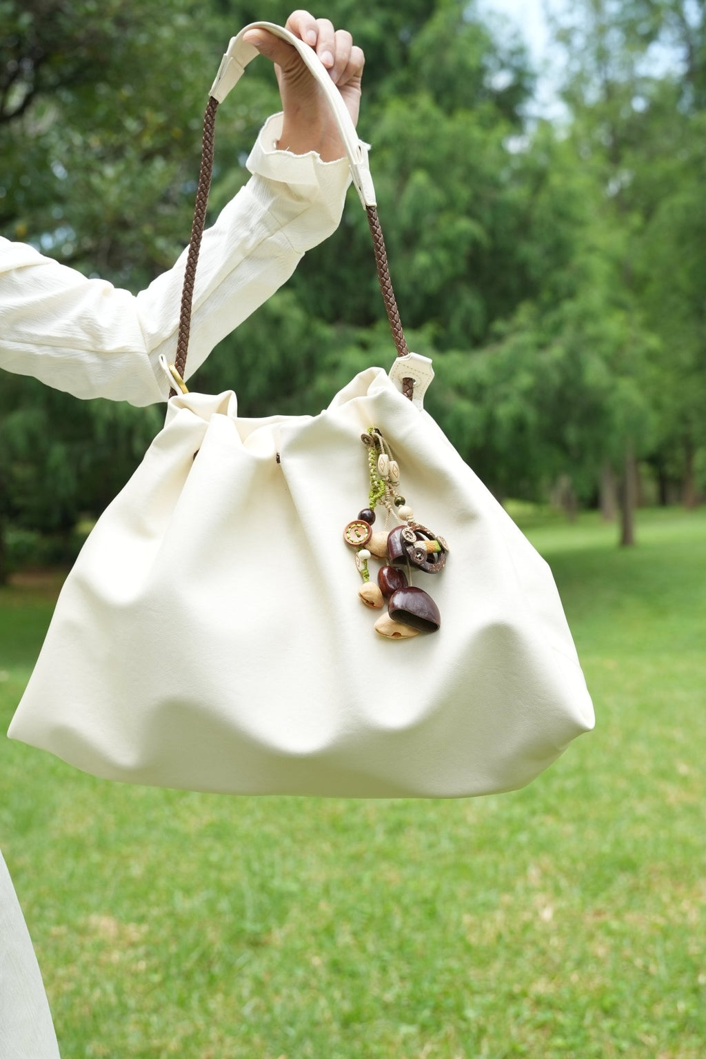 "The Forest Wanderer" - Hand - Woven Natural Seed & Coconut Shell Bag Charm - Yunicrafts