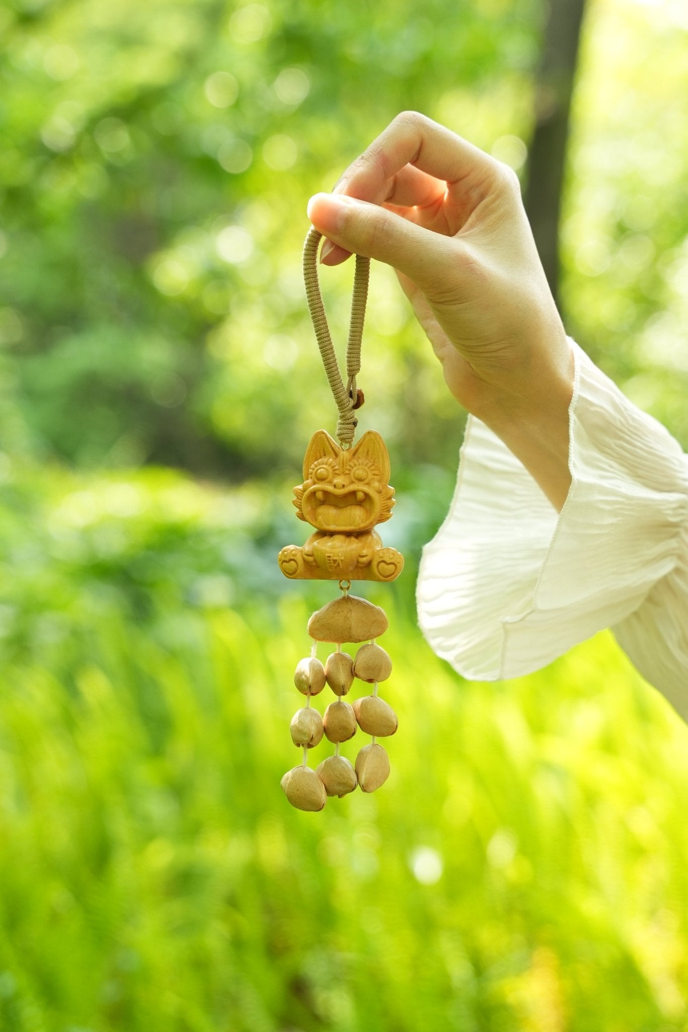 "The Fortune Tiger" - Hand - Carved Wood Wealth Charm with Cascading Seed Bells - Yunicrafts