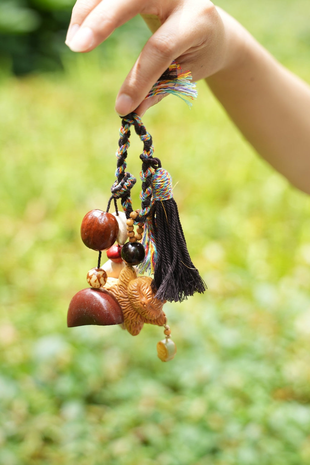 "The Guardian Lion" - Hand - Carved Wood Bag Charm with Tassel & Seed Bell - Yunicrafts