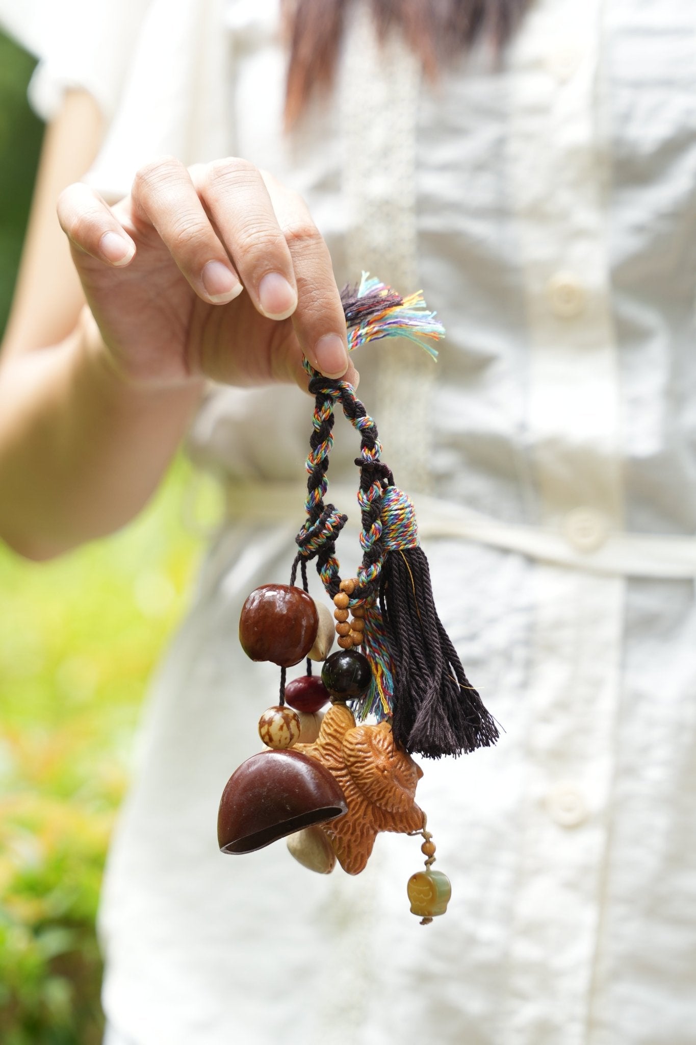 "The Guardian Lion" - Hand - Carved Wood Bag Charm with Tassel & Seed Bell - Yunicrafts