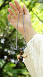 "The Guiding Star" - Natural Seed Pendant Necklace with Glazed Star Bead - Yunicrafts