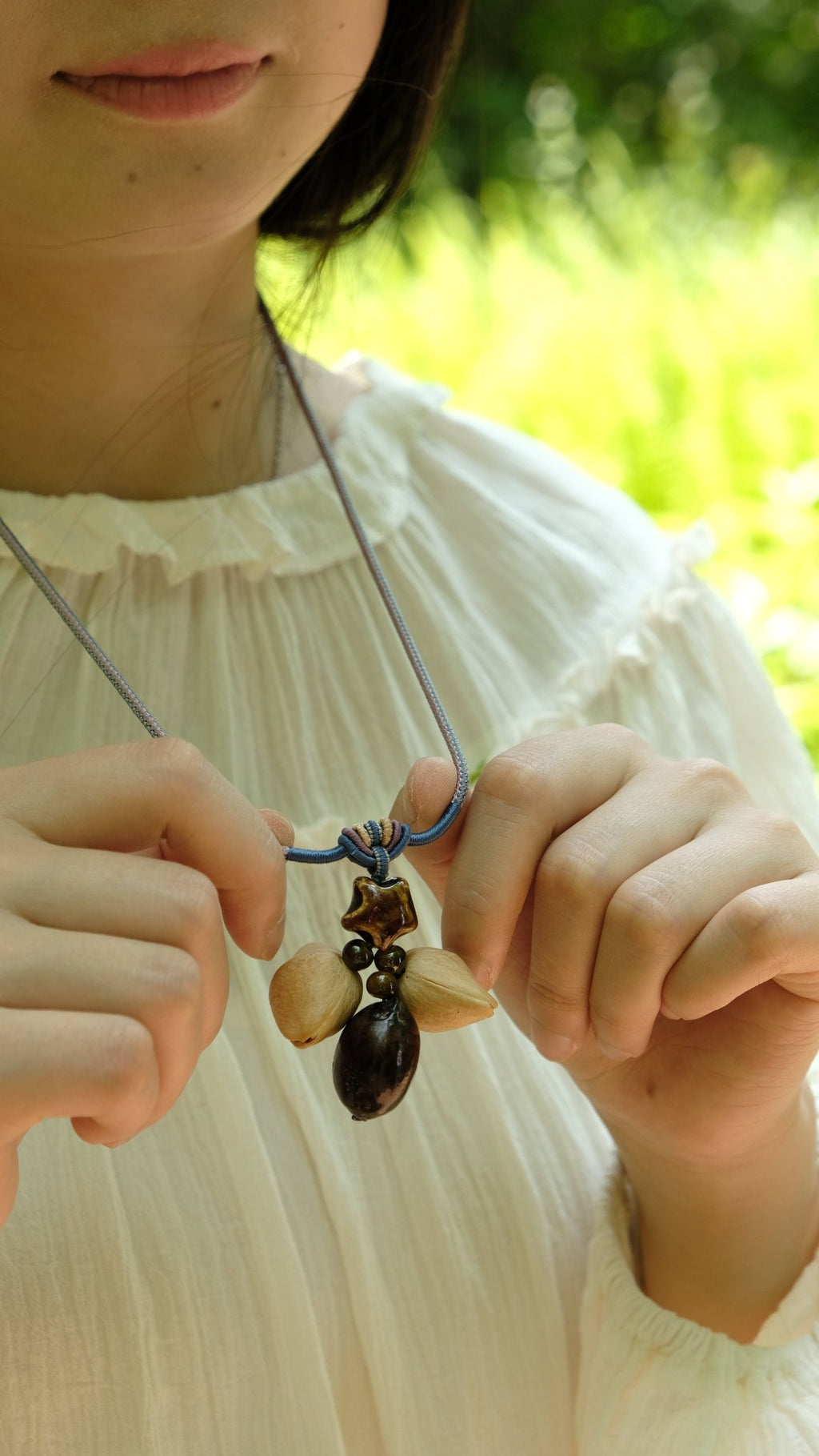"The Guiding Star" - Natural Seed Pendant Necklace with Glazed Star Bead - Yunicrafts