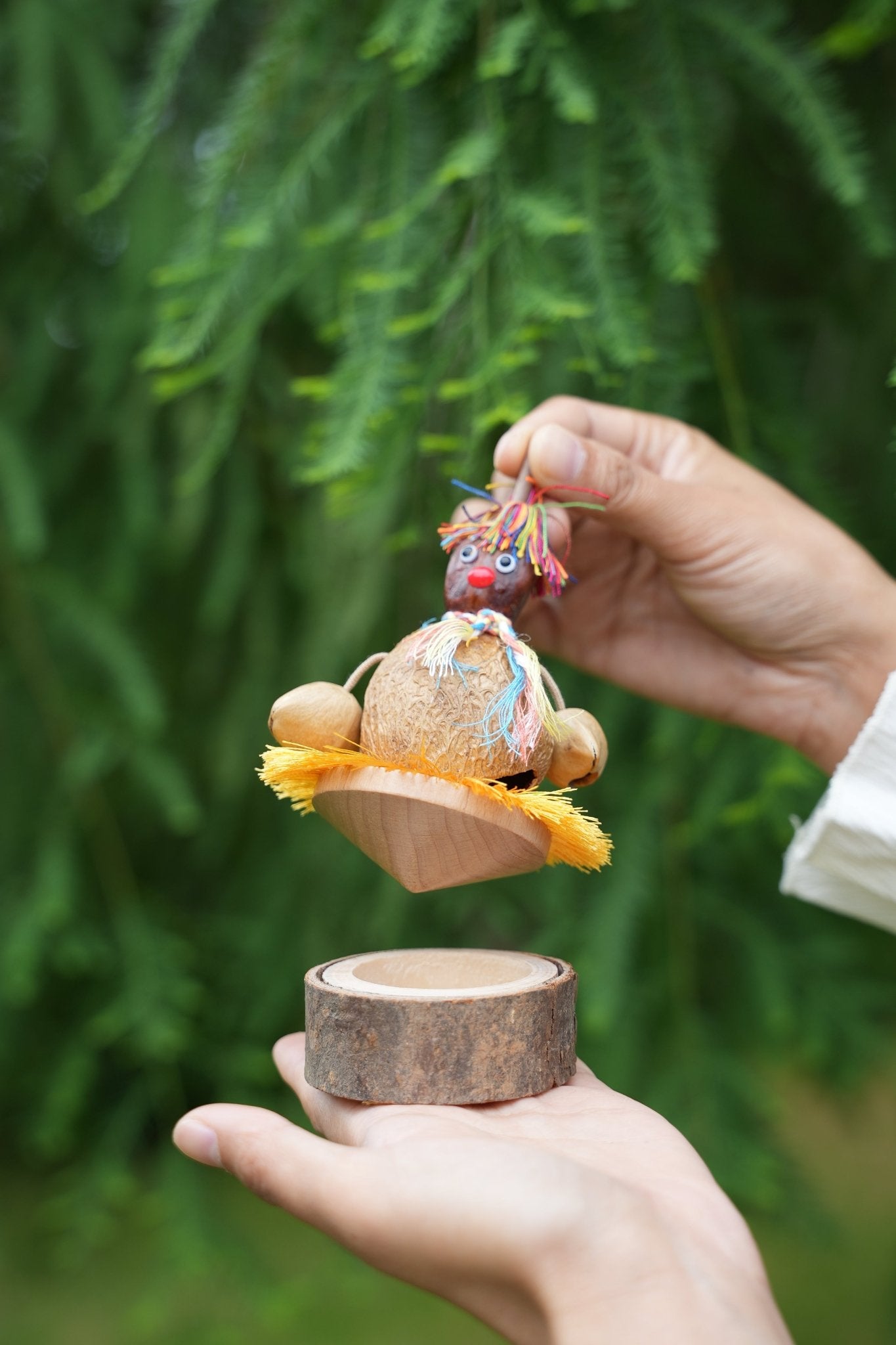 "The Hula Dancer" - Handcrafted Coconut Shell Spinning Top Toy with Log Base - Yunicrafts