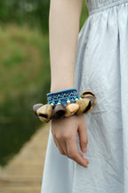 "The Indigo Beat" - Ethnic Embroidered Wrist Rattle with Natural Seed Bells - Yunicrafts