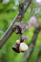 "The Leather Elephant Guardian" - Handcrafted Leather Bag Charm with Natural Seed Bells - Yunicrafts
