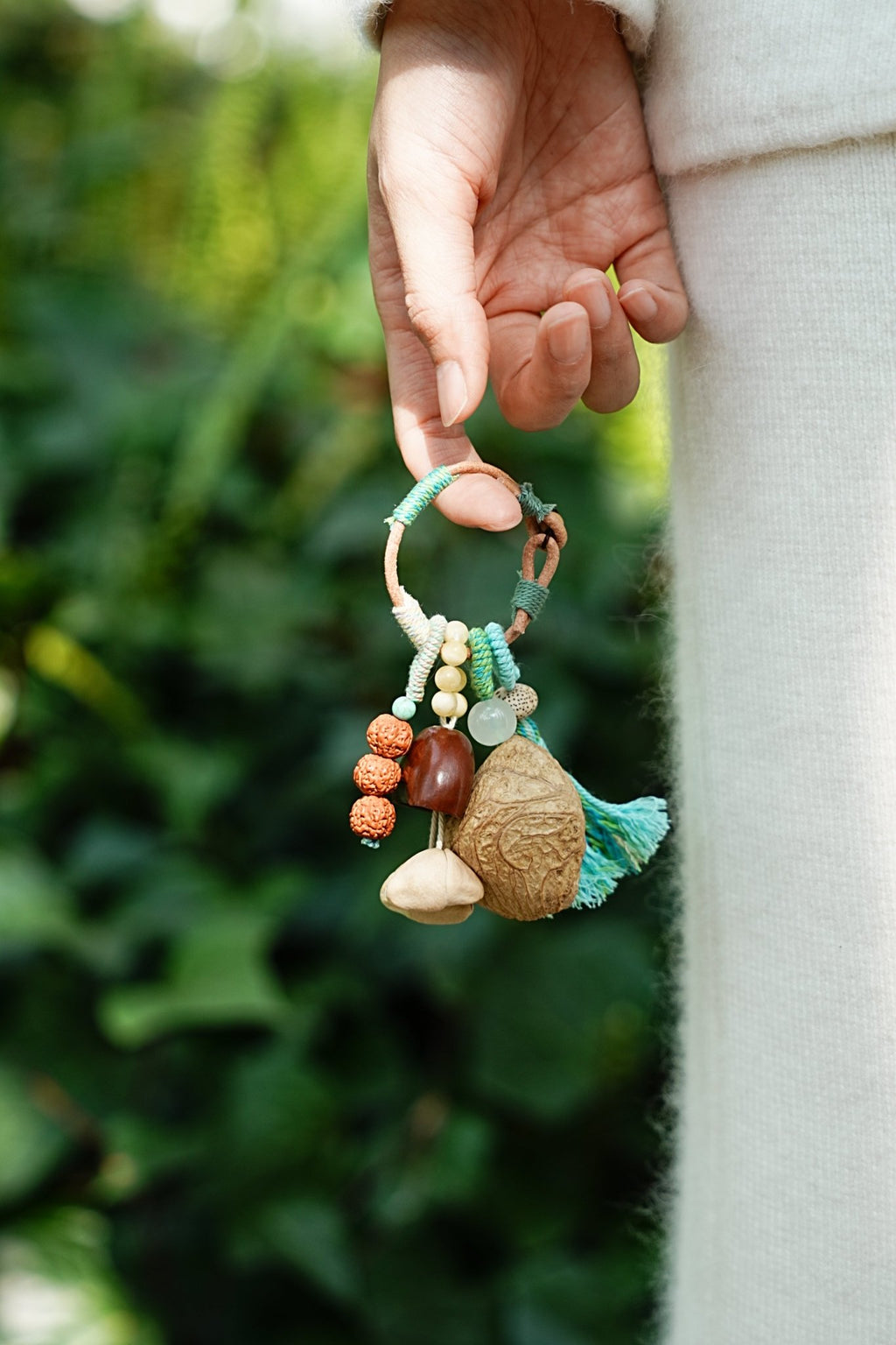 "The Mint Breeze" - Hand - Wrapped Tassel Charm with Rudraksha & Jade - Tone Bead - Yunicrafts
