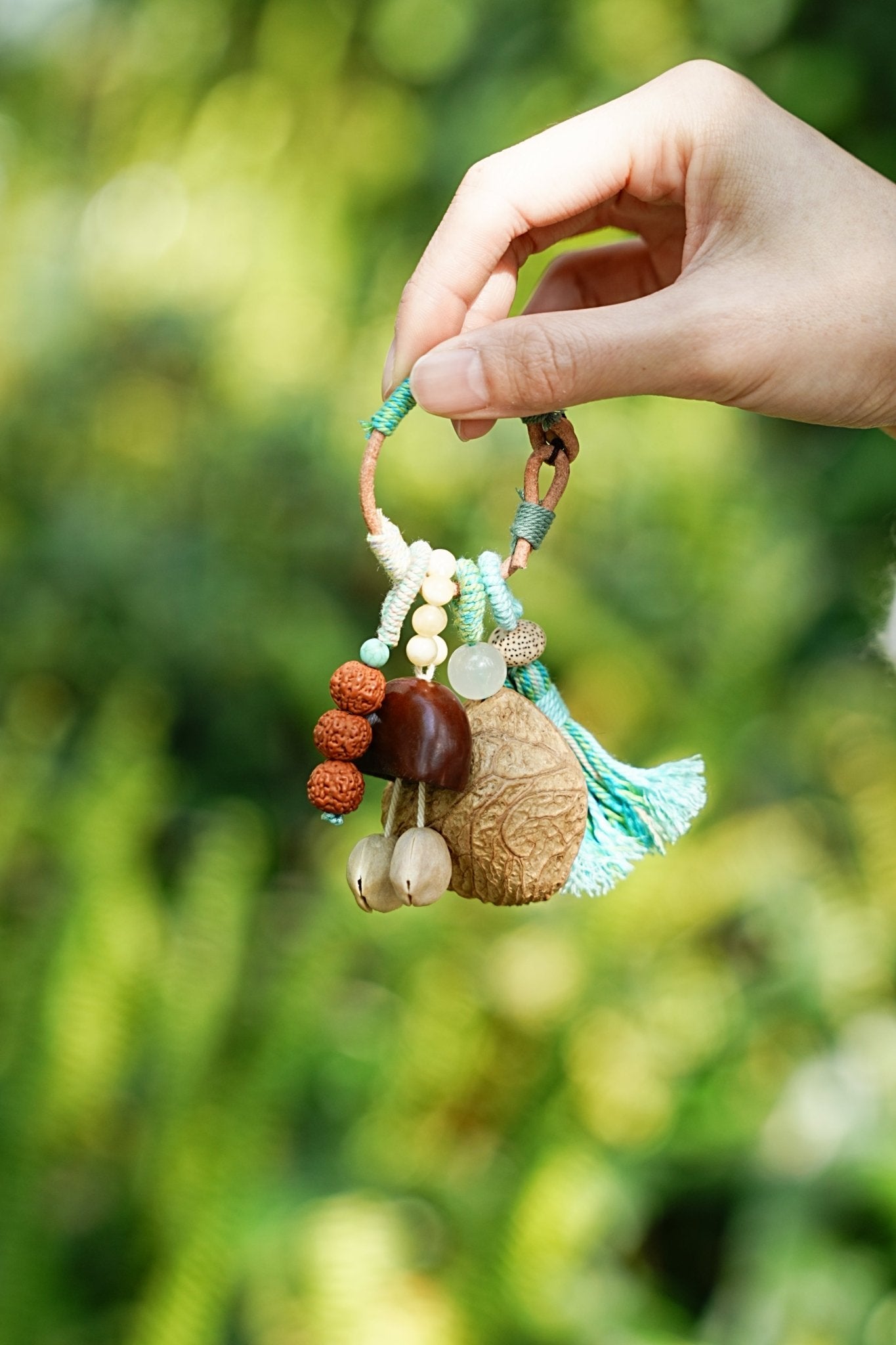 "The Mint Breeze" - Hand - Wrapped Tassel Charm with Rudraksha & Jade - Tone Bead - Yunicrafts