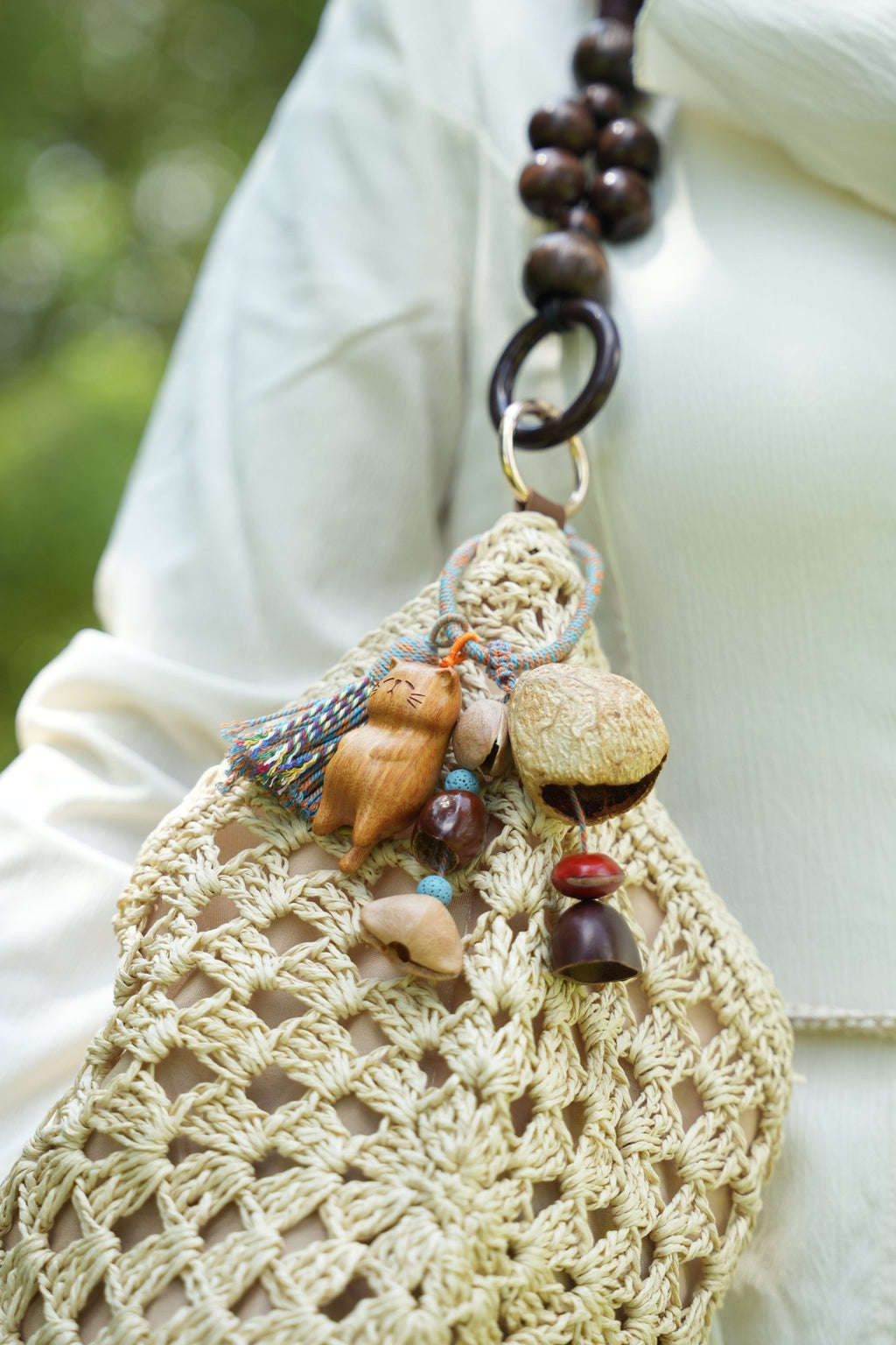 "The Naptime Kitty" - Hand - Carved Wooden Cat Charm with Natural Seeds & Tassel - Yunicrafts