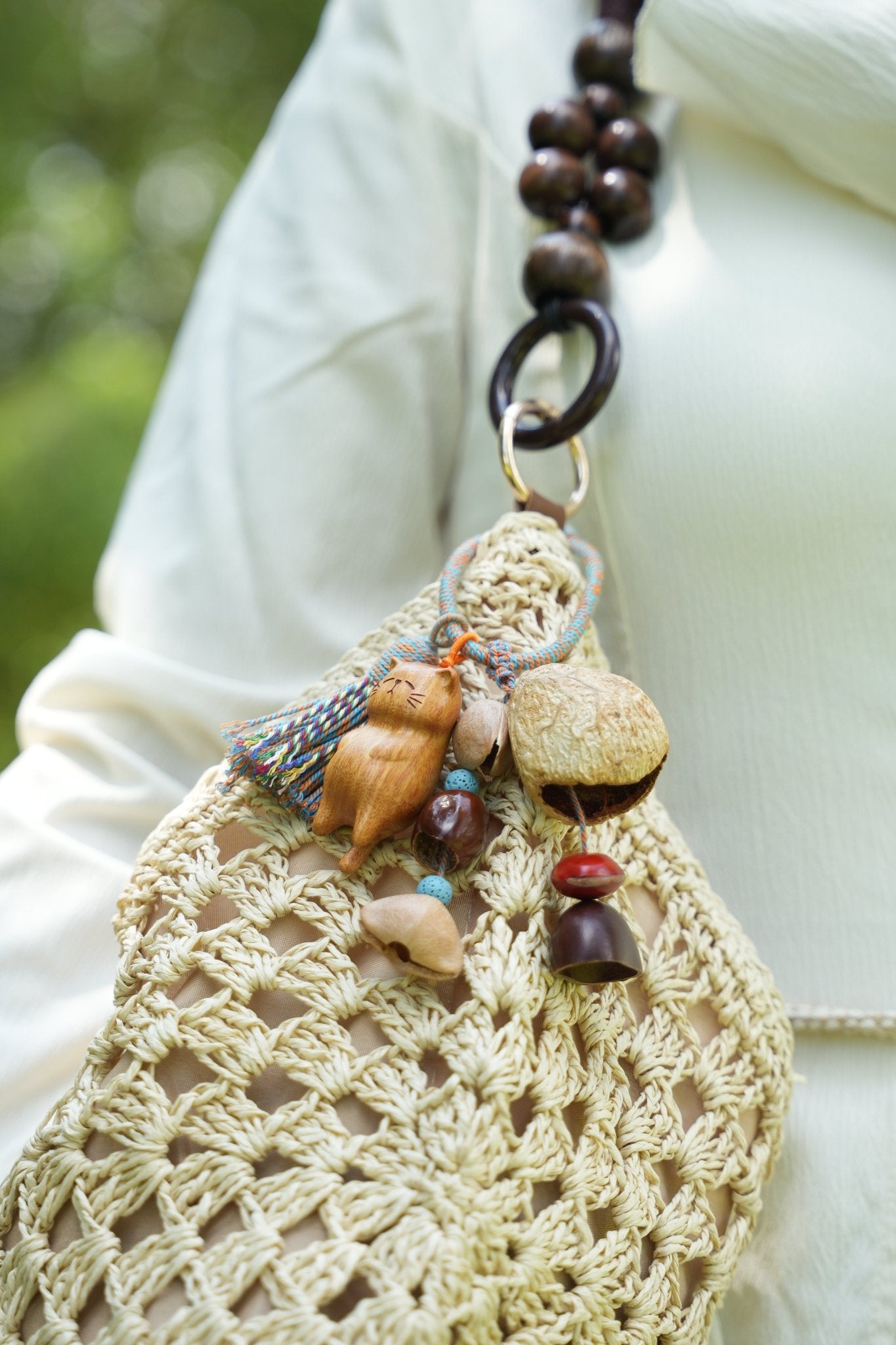 "The Naptime Kitty" - Hand - Carved Wooden Cat Charm with Natural Seeds & Tassel - Yunicrafts