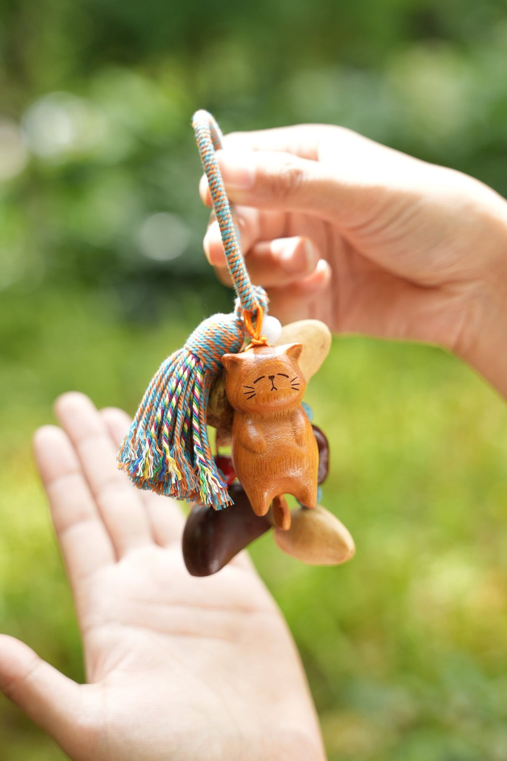 "The Naptime Kitty" - Hand - Carved Wooden Cat Charm with Natural Seeds & Tassel - Yunicrafts