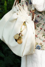 "The Pastel Picnic" - Hand - Wrapped Yarn Charm with Olive Detail & Seed Pods - Yunicrafts