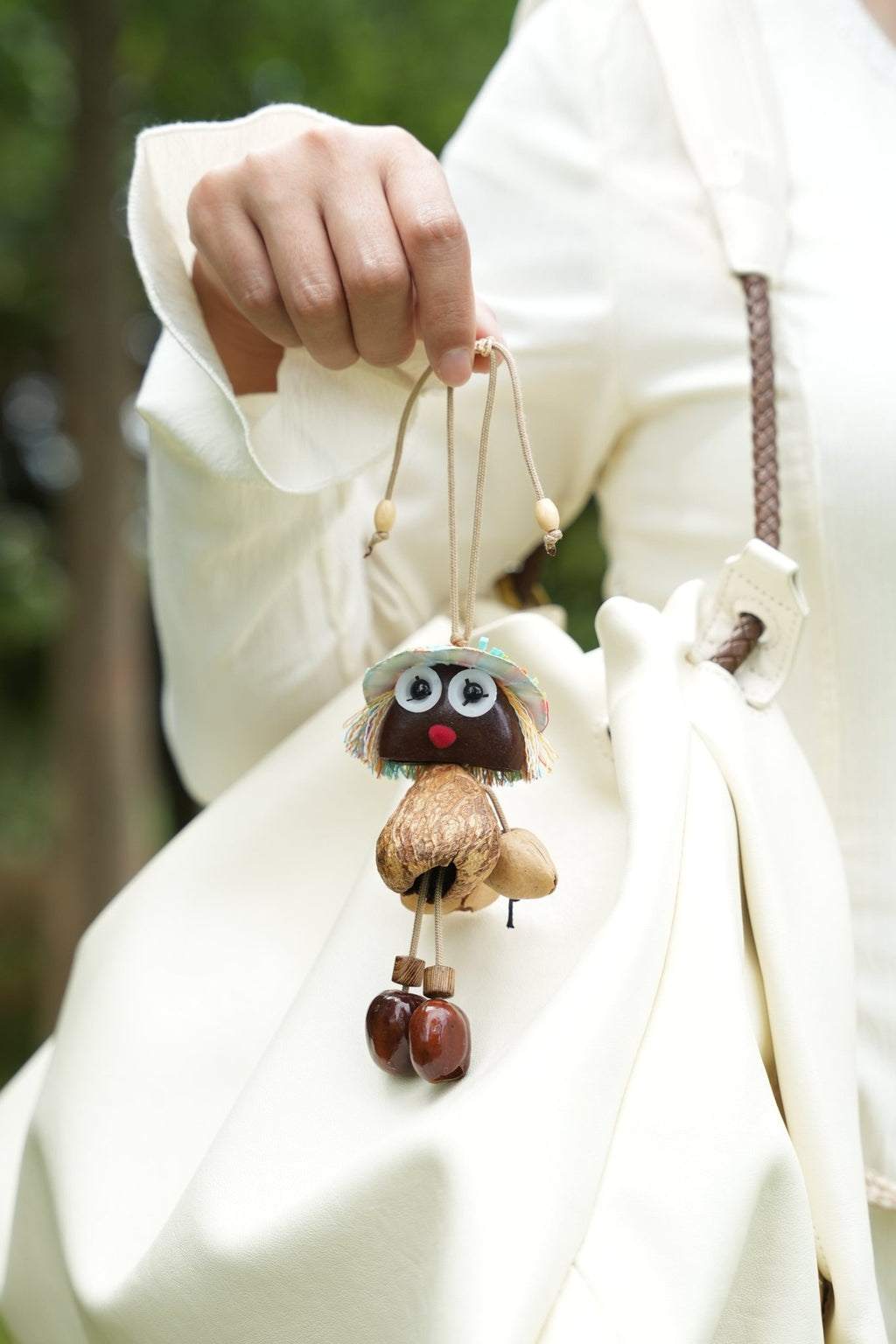 "The Seed Sprite" - Handcrafted Nut Shell Doll Charm with Colorful Fringe Hair - Yunicrafts