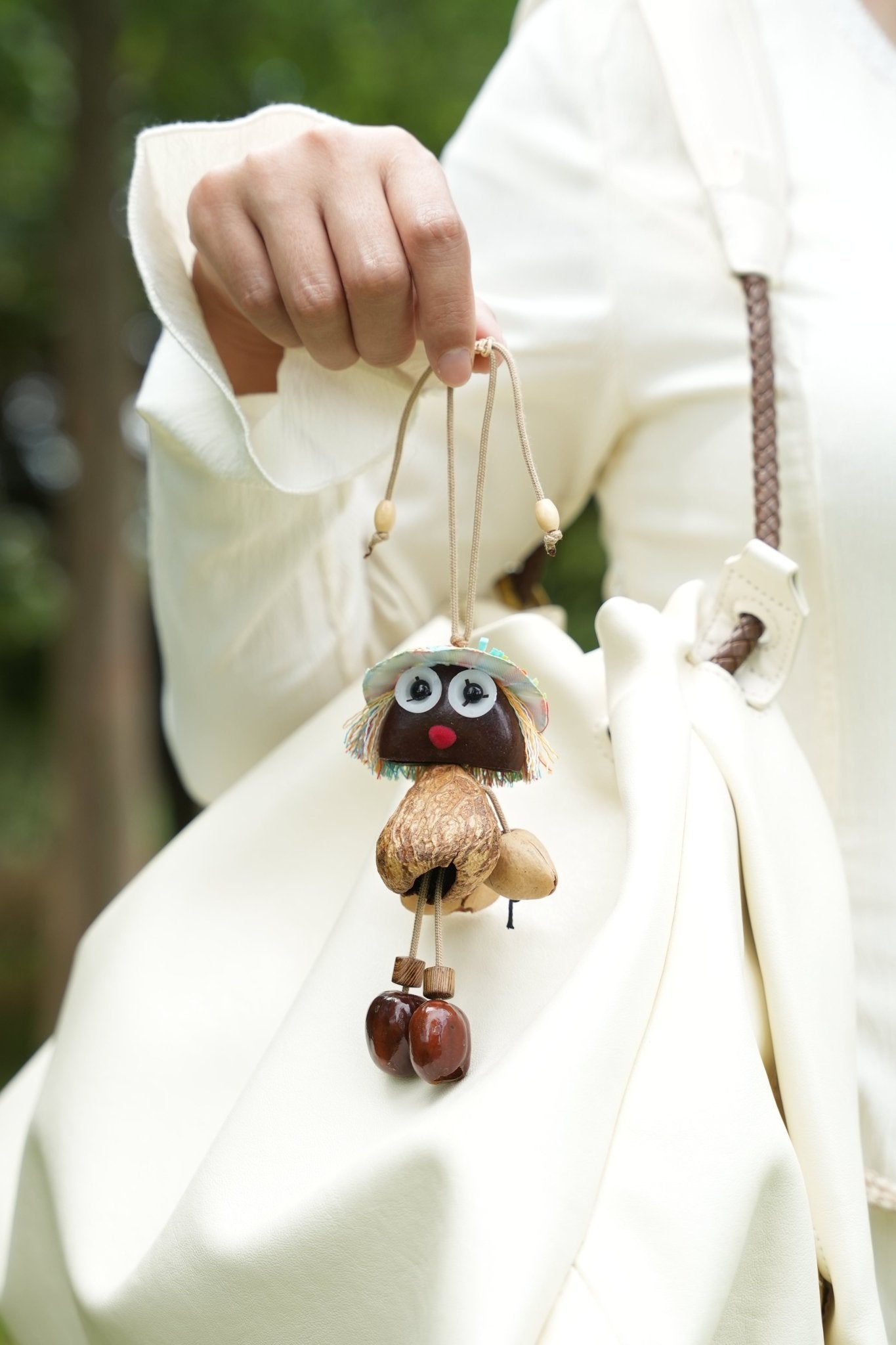"The Seed Sprite" - Handcrafted Nut Shell Doll Charm with Colorful Fringe Hair - Yunicrafts