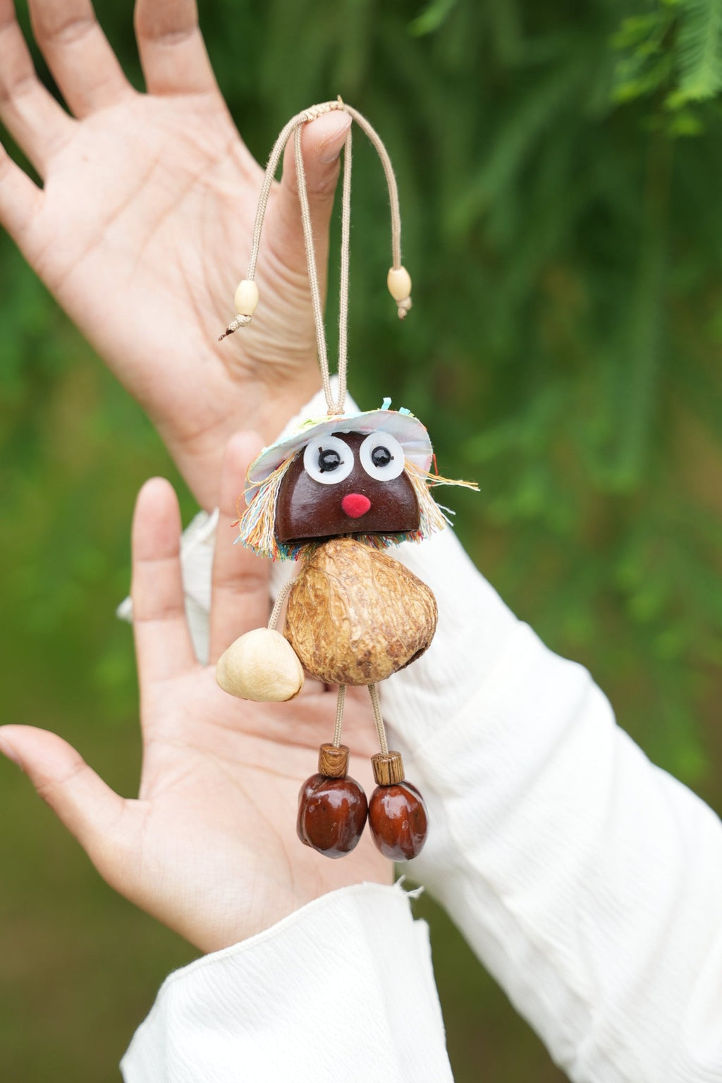 "The Seed Sprite" - Handcrafted Nut Shell Doll Charm with Colorful Fringe Hair - Yunicrafts