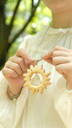 "The Solar Crystal" - Hand - Carved Wood Sun Pendant with Raw Floating Gemstone - Yunicrafts