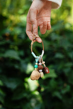 "The Spring Breeze" - Mint Green Wrapped Nut Shell Bag Charm with Turquoise Beads - Yunicrafts