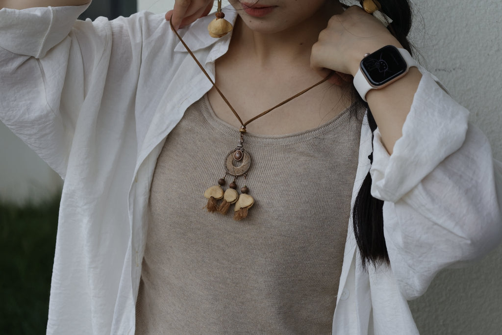 "The Sunset Weaver" - Bronze Woven Mandala Necklace with Natural Seeds & Brown Tassels - Yunicrafts