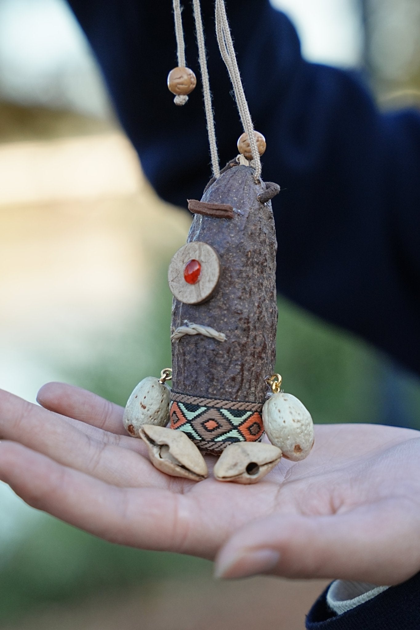 "The Tribal Cyclops" - Handcrafted Seed Pod Totem with Woven Belt & Single Eye - Yunicrafts
