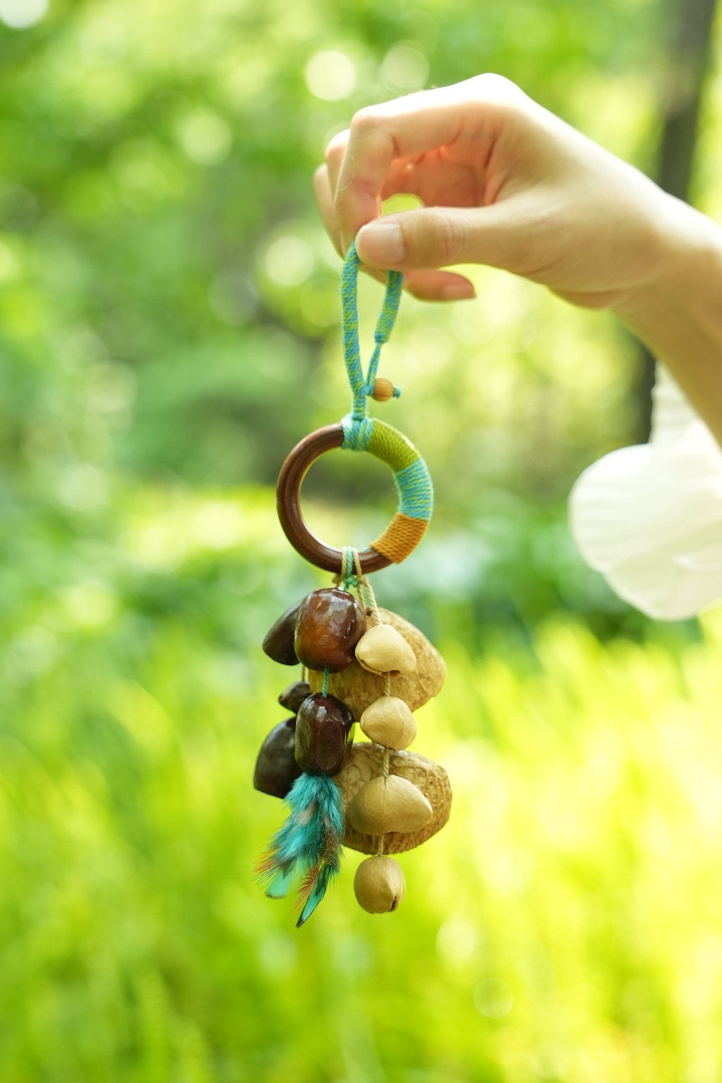"The Tribal Feather" - Wrapped Wood Ring Bag Charm with Real Feather & Nuts - Yunicrafts