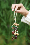 "The Woodland Whisper" - Sage Green Macrame & Natural Seed Bag Charm - Yunicrafts