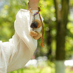 "The Tribal Rhythm" - Hand - Woven Macrame Bracelet with Singing Seed Pods - Yunicrafts