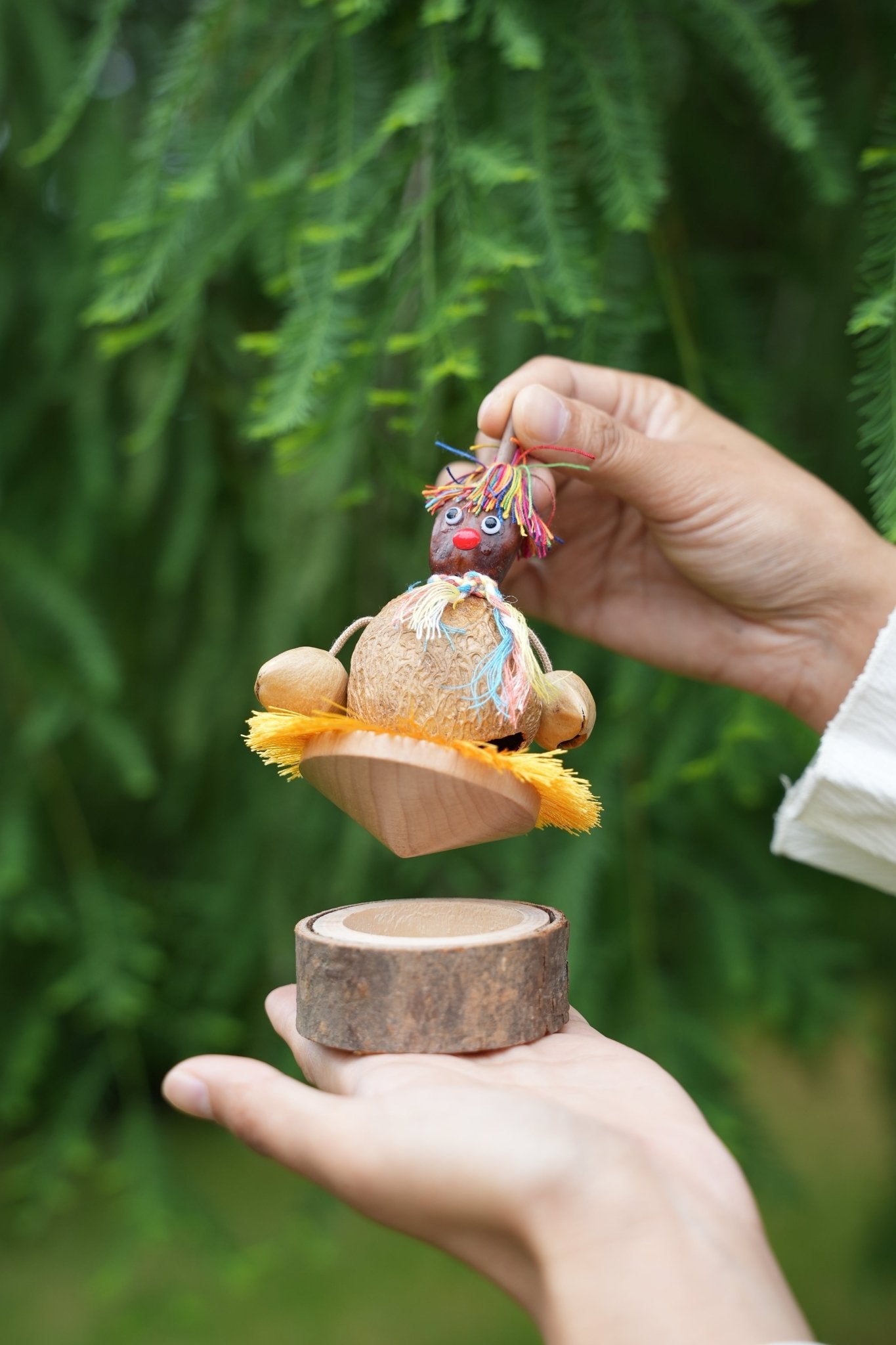"The Hula Dancer" - Handcrafted Coconut Shell Spinning Top Toy with Log Base - Yunicrafts