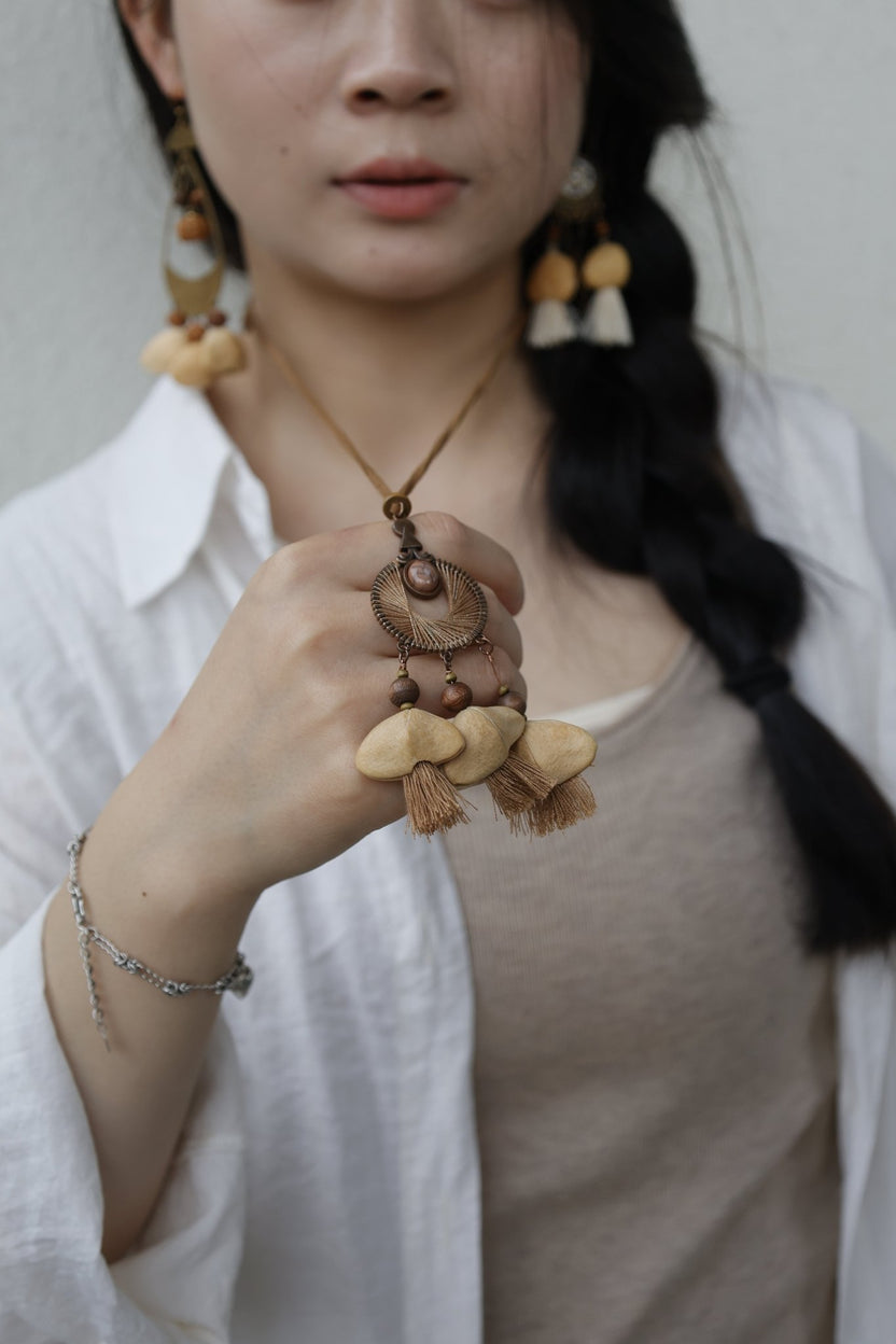 "The Sunset Weaver" - Bronze Woven Mandala Necklace with Natural Seeds & Brown Tassels - Yunicrafts
